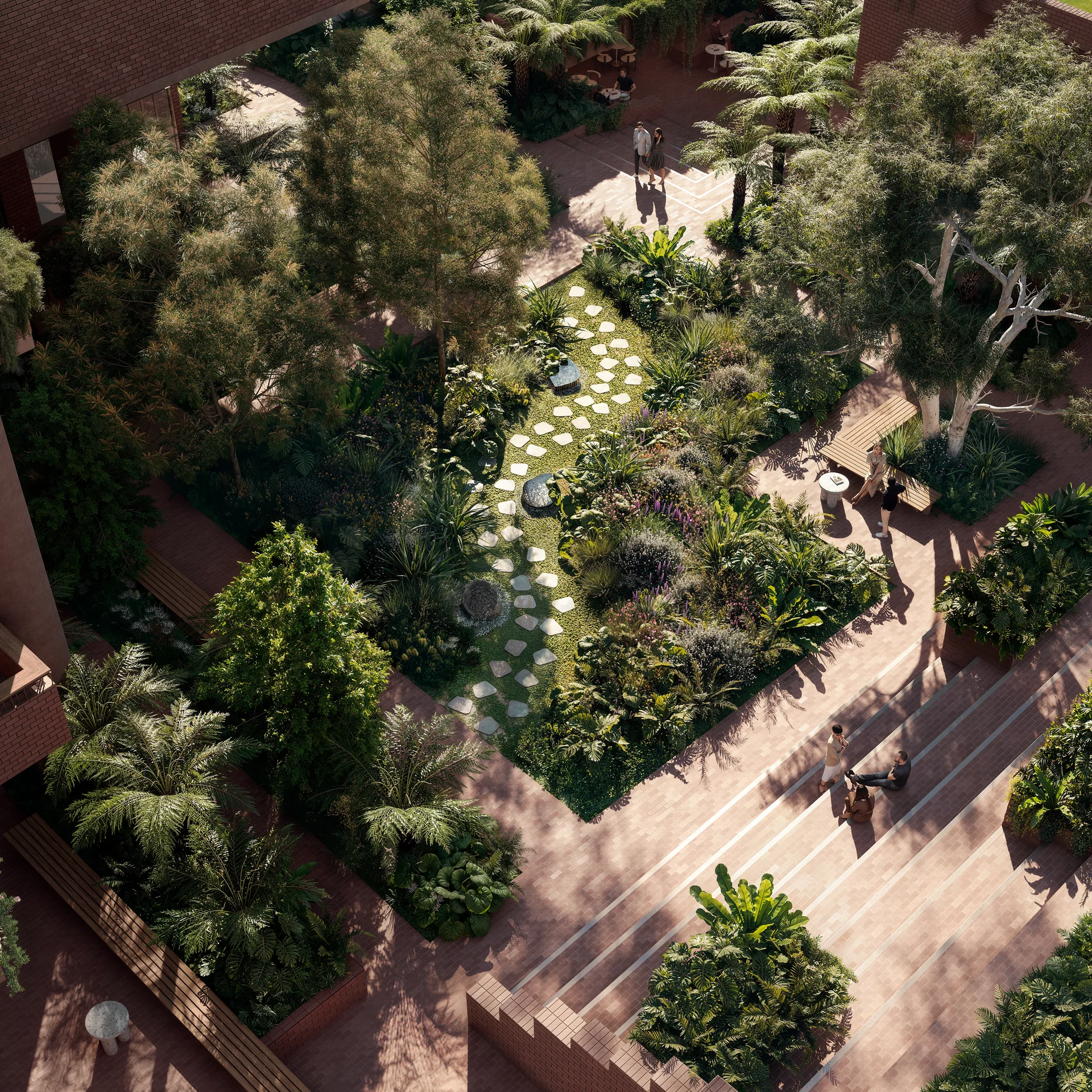 Aerial view of a landscaped courtyard garden with pathways, seating areas and dense planting.